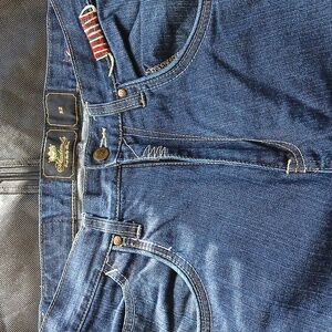 A pair of academics size 32 denim jeans